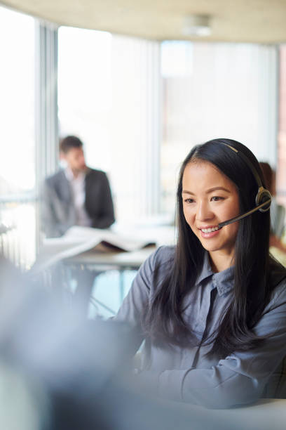istock office team member on the phone 1606357139