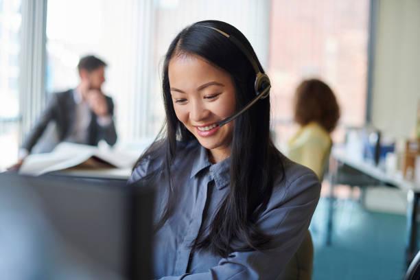 istock office team member on the phone 1606357672