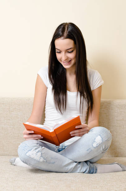 istock teen girl reading 160635983