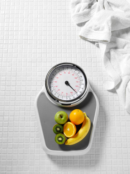 istock Healthy Lifestyle on Bathroom Scales 160637154