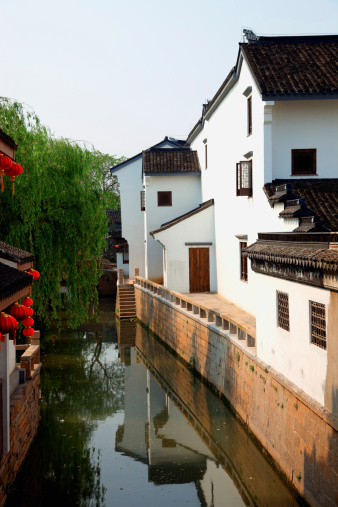 Water canal in Suzhou, Jiangsu. Suzhou is famous for its silk, ancient gardens and is also known as the \