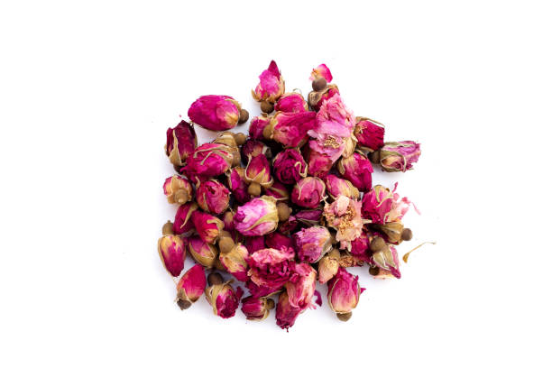 istock Dried roses for tea on white background. 1606422171