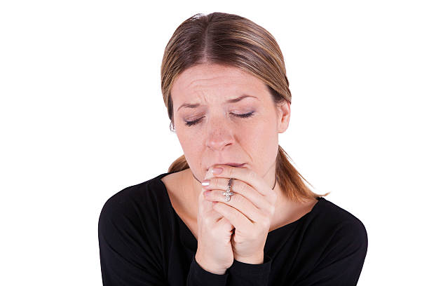 istock Praying Young Woman 160644822