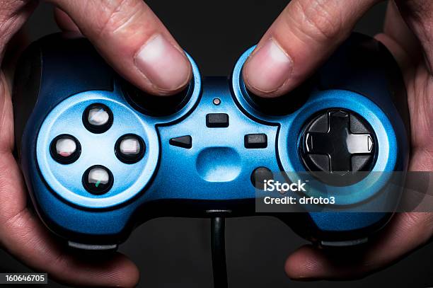 Gamepad Foto de stock y más banco de imágenes de Agarrar - Agarrar, Competición, Diversión