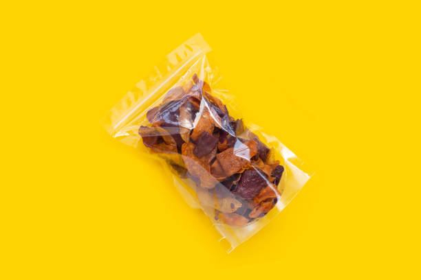 istock Thai taste crispy sweet potato chips in package bag 1606486246