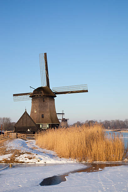 istock Windmill in winter time with snow ice 160649488