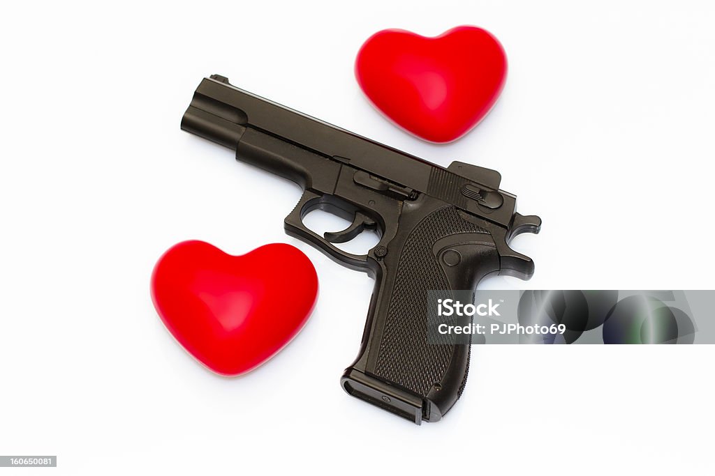 Dos en forma de corazón con pistola - Foto de stock de Acero libre de derechos