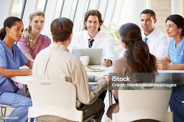 Medical Team Discussing Treatment Options Stock Photo - Download Image Now - Meeting, Patient, Doctor