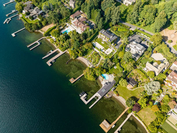 istock Luxury Homes Along The Lake 1606579406
