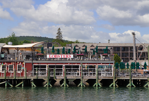 Bar Harbor, Maine, USA. June 14, 2022.  Dockside lobster and seafood restaurant in downtown Bar Harbor, Maine.  A popular location for tourists and local residents from this 
Maine resort town.