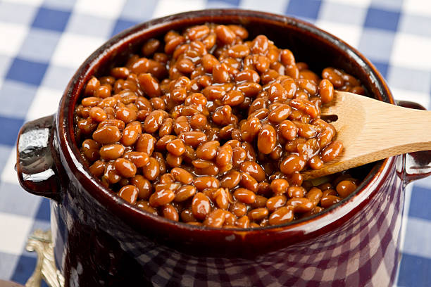 istock Pot of Baked Beans on a Blue Gingham 160666408