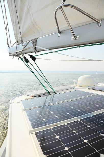 istock Solar Panels charging batteries aboard sail boat 160669329