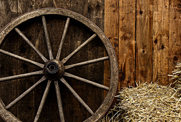 istock Vintage wooden carriage wheel 160670060