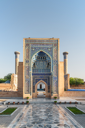 Awesome view of the Gur-e-Amir (Guri Amir) in Samarkand, Uzbekistan. Exterior of mausoleum of the Turco-Mongol conqueror Timur (Tamerlane). The tomb is a popular tourist attraction of Central Asia.