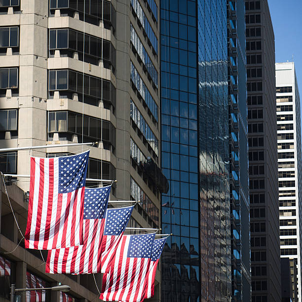 istock Flag in row on downtown new york city district 160671219