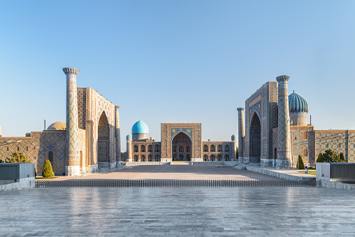 Awesome view of the Registan Square in Samarkand, Uzbekistan. The Ulugh Beg Madrasah, the Tilya-Kori Madrasah and the Sher-Dor Madrasah. The Registan is a popular tourist attraction of Central Asia.