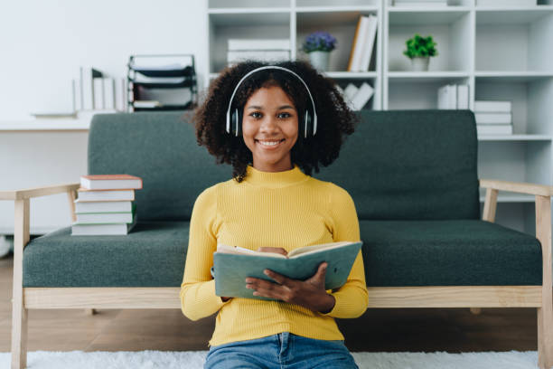 istock Video call, african american university foreign exchange students study online on laptop computer and using notebook learn english language class Program by international specialists at home 1606717080