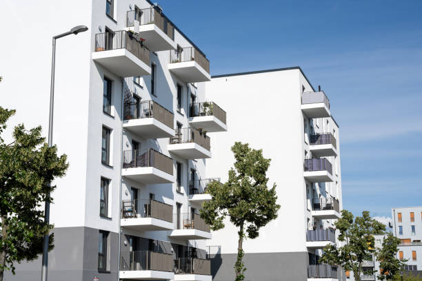 istock Newly built white apartment buildings 1606732311