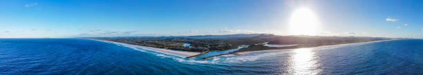 Panoramic aerial view of a beach town Aerial view of Brunswick Heads, near Byron Bay, NSW, Australia brunswick heads nsw stock pictures, royalty-free photos & images