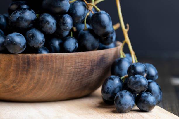 istock Unwashed blue grapes in the dust 1606825364