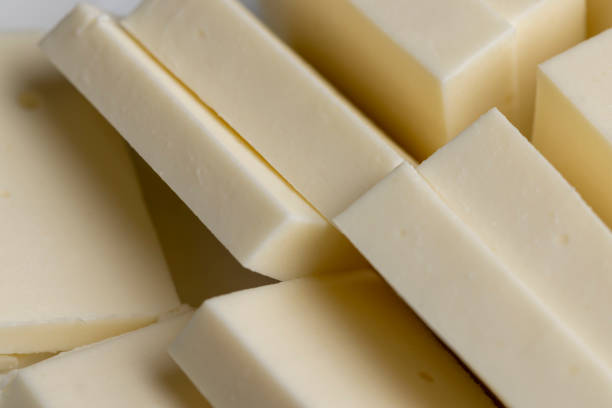 istock Sliced cream cheese for salads 1606831472