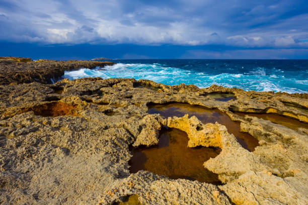 istock stony sea coast at the storm 1606878401