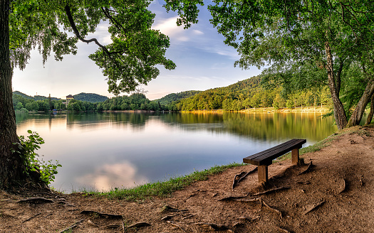 Lake during summer where you can relax. There is beautiful landscape.