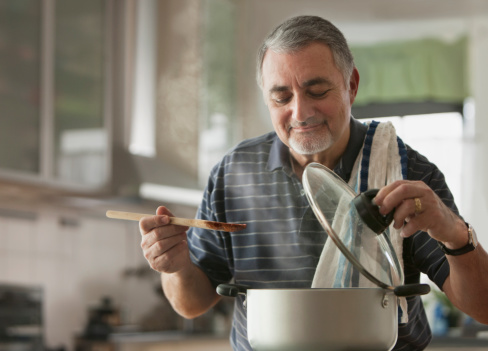 istock Elderly man cooking 160690289