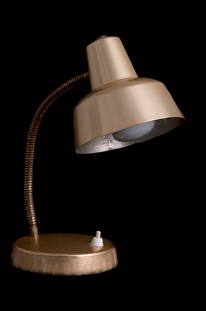 Vintage desk lamp Vintage desk lamp isolated on black gold desk lamp stock pictures, royalty-free photos & images