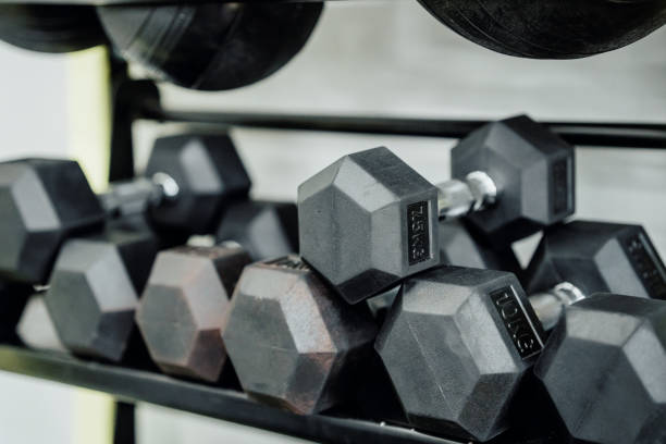 istock Dumbbells in the gym 1607000540