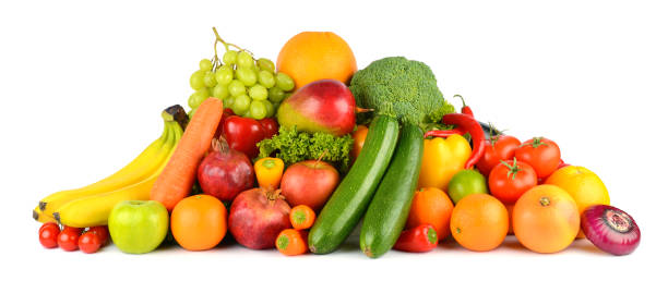 istock Fresh fruits and vegetables in pile isolated on white 1607034454