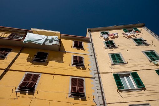Vivid facades at the harbor of Riomaggiore.