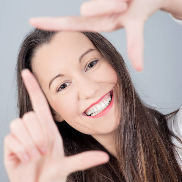 istock Brunette woman smiling 160707507
