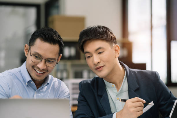 istock Male Operations Manager Holds Meeting Presentation for analysis graph company financial. People Work in Business Office. 1607076105