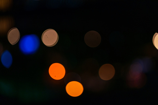 Defocused city lights, colorful bokeh abstract background