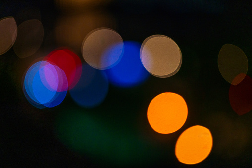 Defocused city lights, colorful bokeh abstract background