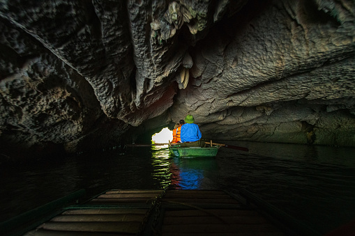 Ninh binh, Vietnam - November, 28. 2018: Floating down the river through the cave