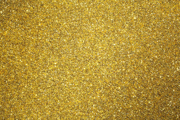 istock Golden glitter background texture. Shiny gold 1607088481