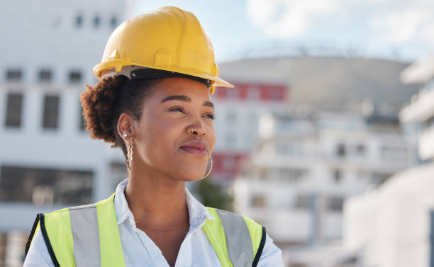 istock Thinking, engineer and woman in a city, ideas and development with helmet, construction worker and property vision. Female person, inspector and architect with solution, problem solving and planning 1607110012