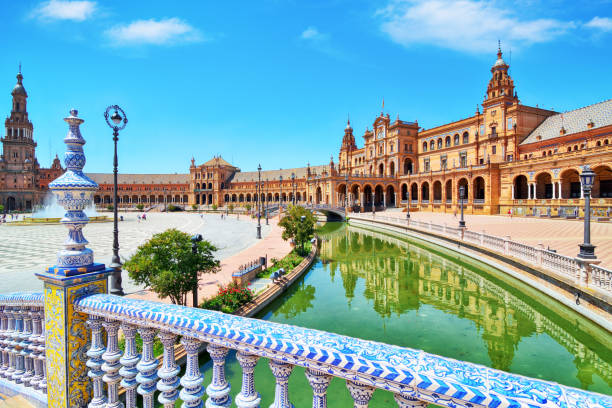 Plaza de Espana in Seville The Plaza de Espana, built in 1928, is a plaza in the Parque de Maria Luisa in Seville, Spain andalusia stock pictures, royalty-free photos & images
