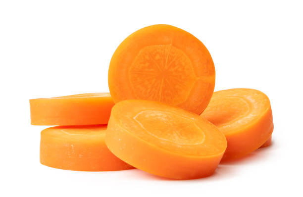 istock Fresh beautiful carrot slices in stack isolated on white background witch clipping path. Front view. 1607148362