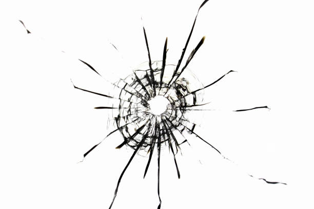 istock white background bullet hole on glass texture abstract window 1607156477