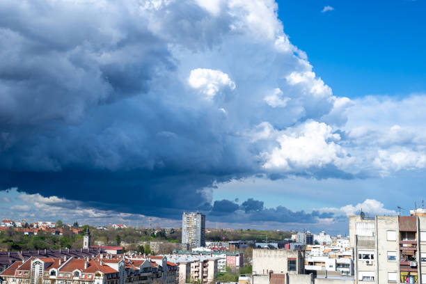 Dramatic stormy sky above a quarter of city residential buildings