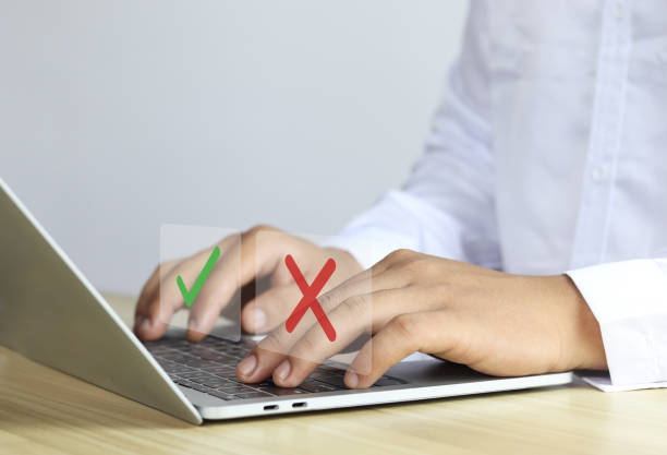 istock Businessman shows yes or no 1607190311