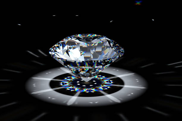 istock Round brilliant diamond in spotlight with colorful refraction rays. 1607218919