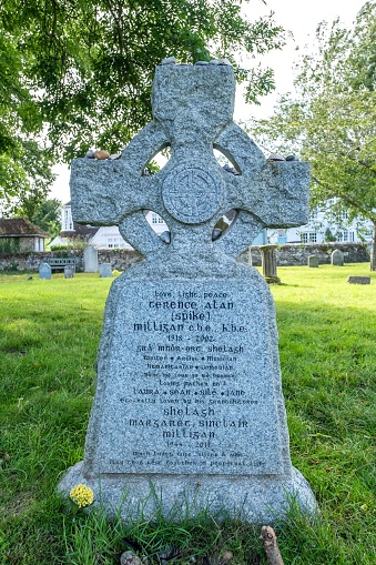 Winchelsea, United Kingdom – August 01, 2023: A vertical closeup of an old gravestone in a cemetery of Winchelsea, UK
