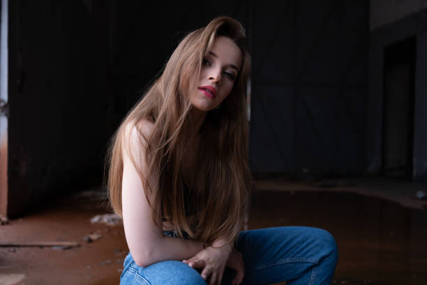 Portrait of satisfied relaxed young female model.