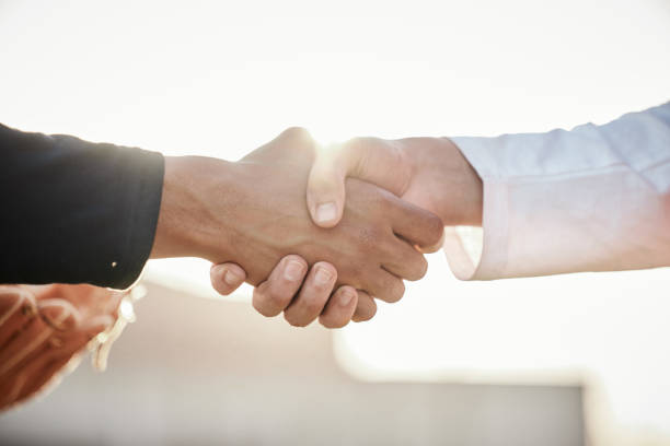 istock Baseball, sports respect or handshake for team greeting or introduction on stadium field together. Zoom of men shaking hands in softball match or game in competition, training or workout exercise 1607294872