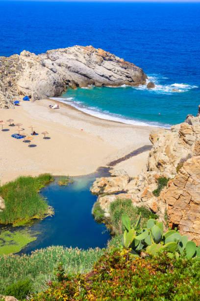 Amazing sandy beach of Nas in Ikaria island, Greece. Amazing sandy beach of Nas in Ikaria island, Greece. ikaria island stock pictures, royalty-free photos & images