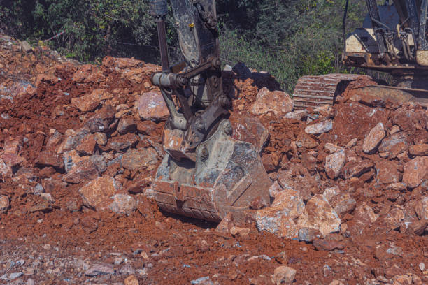 istock Heavy machinery works at the construction site. Clearing rocky soil for construction in Turkey. 1607309635